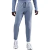 Image de Nike stride dri-fit knit hardloopbroek in de kleur blauw.