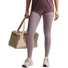 Image de Nike one seamless front tight in de kleur paars.