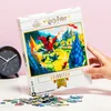 Image de New York Puzzle Company - Harry Potter Quidditch - 1000 stukjes puzzel