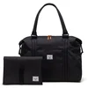 Image de Herschel luiertas Strand Duffle / Diaper Bag 24 L Black zwart