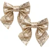 Image de Feeric christmas kerststrikken - 2x - goud - 16 x 14 cm - strikjes