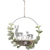 Image de Kersthanger Kerstkrans Metaal met Hert en bambi  met groene besneeuwde blaadjes  en de tekst Noël Ø28cm