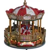 Image de Feeric Lights & Christmas Kerstdorp draaimolen - draaiend - led verlichting - muziek - 23,5 cm