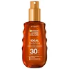 Image de Garnier Ambre Solaire Ideal Bronze Beschermende Olie SPF30   150 ml - Luxueuze Zonbeschermingsolie mét Karitéboter