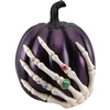 Image de CHAKS - Paarse pompoen met skelethand van hars, 27 cm