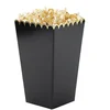 Image de PARTYPRO - 8 zwarte en gouden popcornbakjes 12,5 x 7 cm met geschulpte rand