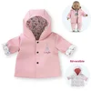 Image de Corolle regenjas babypop 30cm - omkeerbaar poppenkleding roze.
