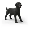 Image de Schleich zwarte labrador retriever speelgoedhond - realistisch dierenfiguur.