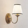 Image de Lindby - Wandlamp - 1licht - Textiel, metaal - H: 27 cm - E14 - crème, antiek messing