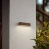 Image de Lucande - LED wandlamp buiten - 1licht - Aluminium spuitgietwerk, glas - H: 6 cm - donkerbruin, transparant - Inclusief lichtbron
