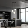 Image de Emibig 3 bollen hanglamp zwart met messing en wit glas - Elegante verlichting voor elk interieur