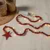 Image de Star Trading kerstverlichtingsketting 'Beady' met houten kralen en ster in naturel, batterijen + timer, warm wit, rood, L 150cm