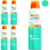 Image de Garnier - Ambre Solaire - Light & Silky - Zonnepsray - Zonnebrandspray - SPF 15 - Voordeelverpakking - 4 stuks