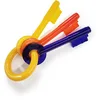 Image de Nylabone Jouet à mâcher pour chiots qui font leurs dents, en forme de clé, arôme bacon, pour les tout petits chiens/chiots (jusqu à 7 kg), mâchouilleurs paisibles/qui font leurs dents.