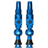 Image de Muc-Off Big Bore Lite Tubeless Valves Bleu 45 mm   Capuchons de poussière conçus avec précision pour les motos avec technologie révolutionnaire Airflow   Capuchons de valve Presta pour VTT sans