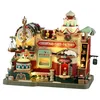 Image de LEMAX Bâtiment mobile et musical "Christmas Cake Factory" en résine H24,5 x 27,8 x 17,7 cm